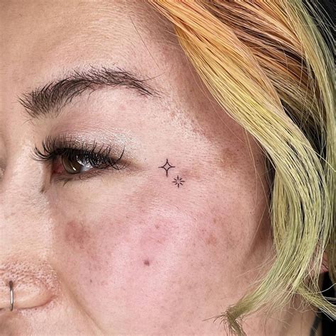Stars Tattooed On Face
