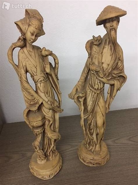 Coppia di statuette cinesi in avorio, imperatore e imperatrice (altezza