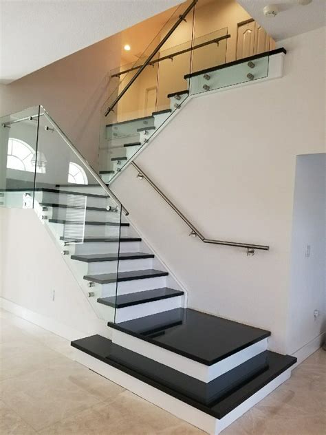 Steel Stair With Marble: A Perfect Combination For A Modern Home