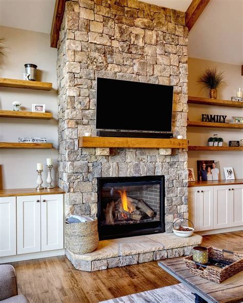 Stone Fireplace With Built Ins On Each Side