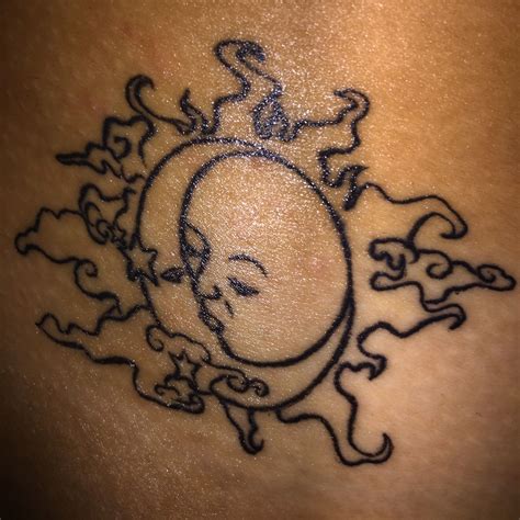 Sun And Moon Kissing Tattoo