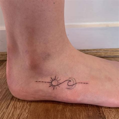 Sun & Moon feet by Rob tattoos ascendingkoi Tattoos