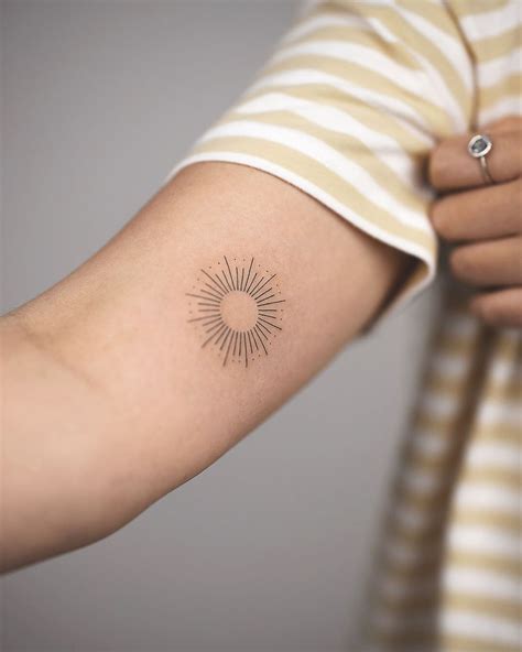 Sun Tattoo On Neck
