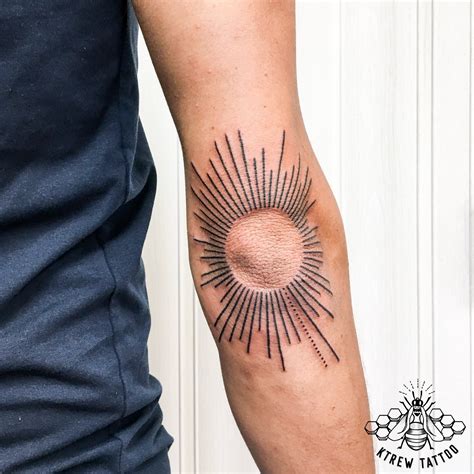Sun Elbow Tattoo