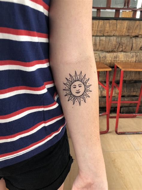 Sun With A Face Tattoo