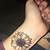 Sunflower Tattoo On Wrist