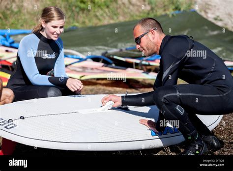 Surf instructor explaining