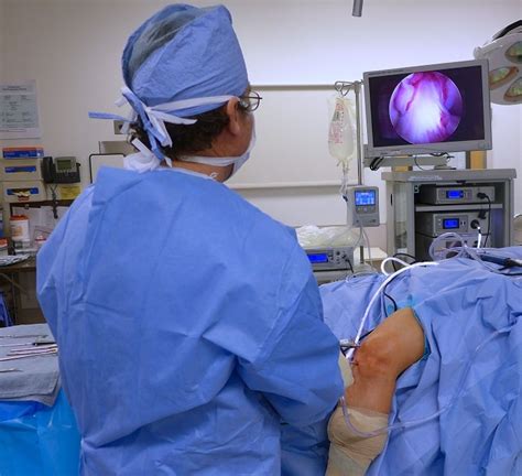 Surgeon performing arthroscopic surgery