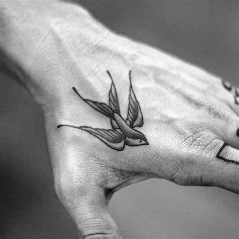 Swallow Hand Tattoo