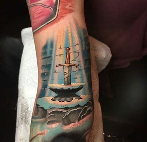 Lauren winzer sword in the stone tattoo Disney tattoos