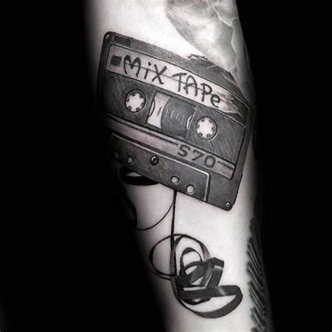 Ruined cassette tape tattoo by Sasha But.maybe inked on