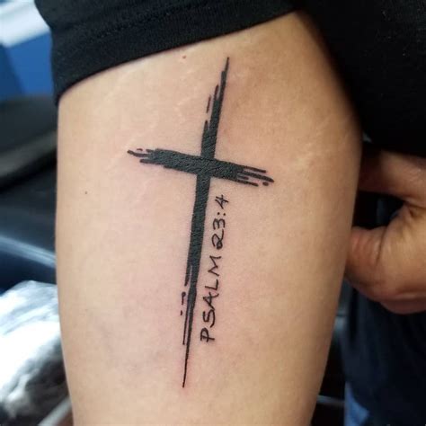 Wooden cross banner tattoo by Pradeep Junior from India