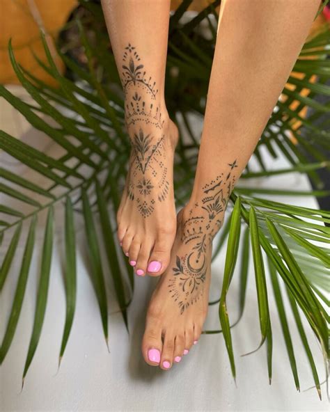 female foot tattoos Foottattoos Feather tattoos