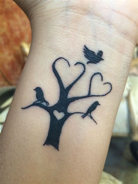 Family tree. The birds represent my children. Tattoos