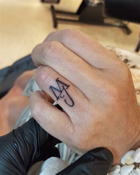 40 Stylish Wrist Initials Tattoos