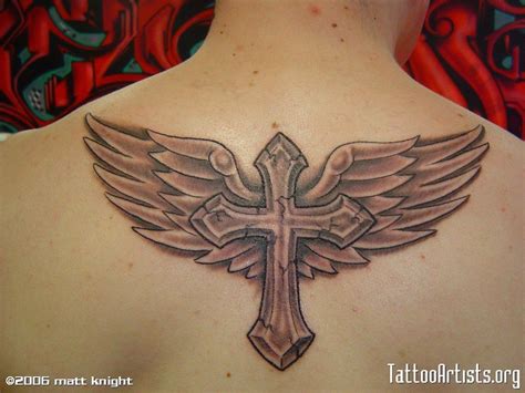 Cross with wings tattoo Cross with wings tattoo, Foot