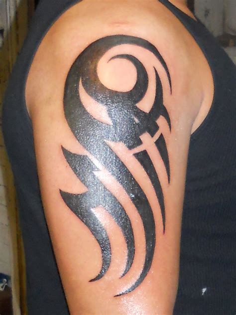 25 Best Tribal Tattoo Designs for Men The Xerxes