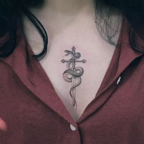 Tattoo In Between Boobs