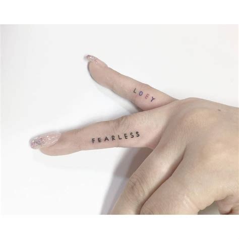Tattoo Lettering On Fingers