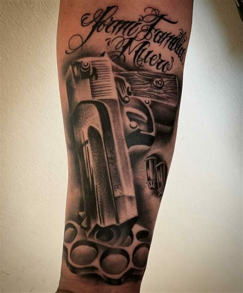 Tattoo Of A Gun
