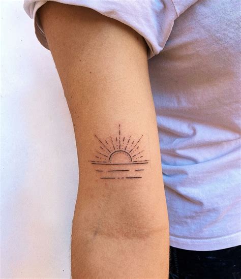 Tattoo Of Rising Sun