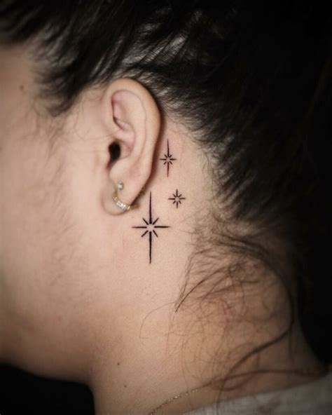 Tattoo Of Stars Behind Ear