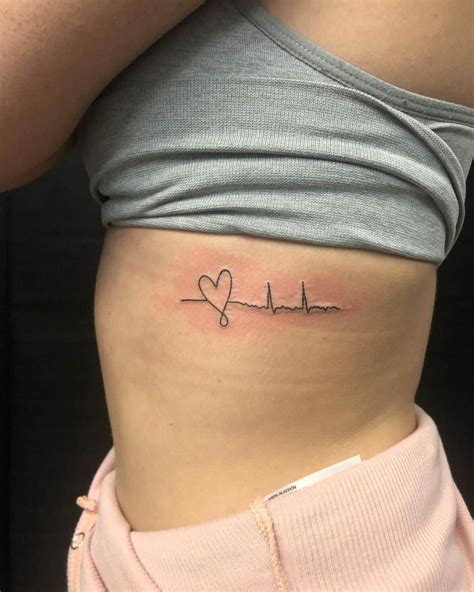 Tattoo On Side Of Body