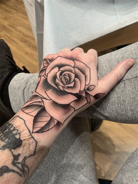 Tattoo Rose In Hand