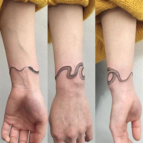 Tattoo Snake Eating Itself