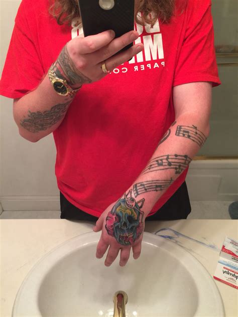 Still swollen but great tattoo/ placement Tattoo