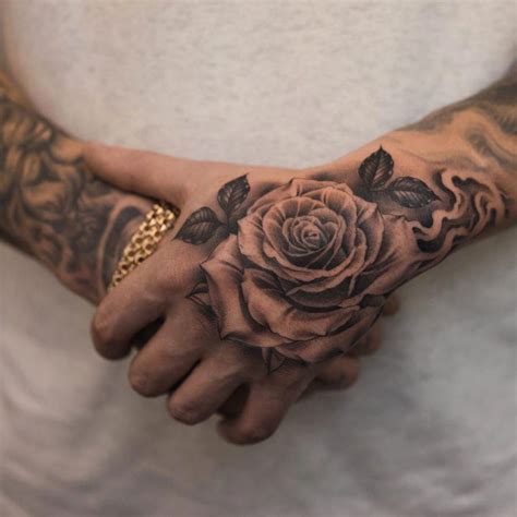 Pin by andy chavez on Tattoo's Hand tattoos for guys