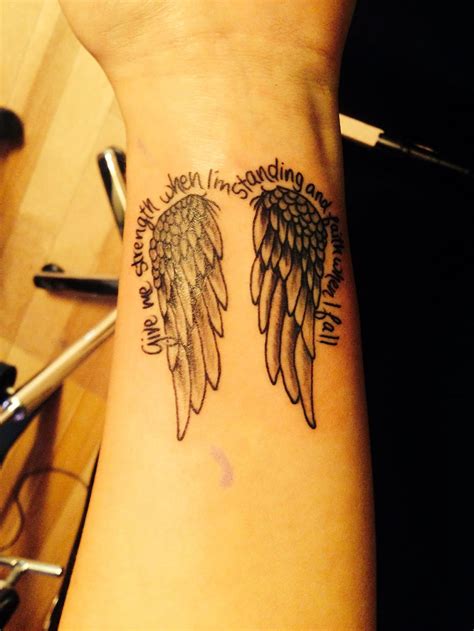 On the wrist instead of the foot Wings tattoo, Angel