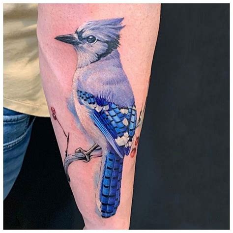 Show your love for blue jays with stunning tattoos