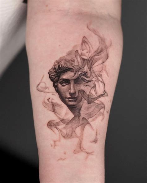 Tattoos Of Statues