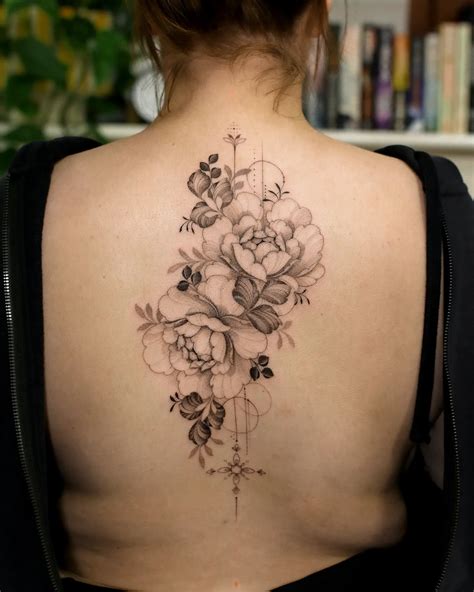 Tattoos On The Upper Back For Females