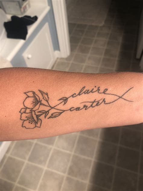 Tattoos With Flowers And Names