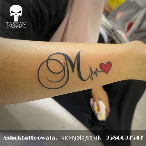 Tattoos With The Letter M