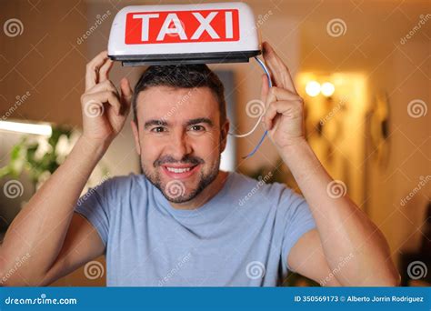 Taxi Driver Holding Sign