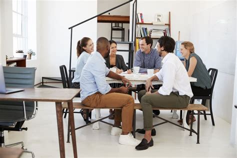 Team Meeting around a table