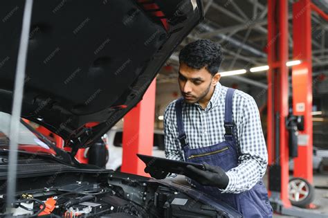 Technician Repairing Car