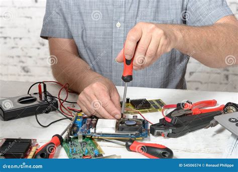 Technician Repairing Computer