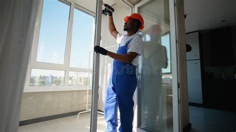 Technician Repairing Power Window