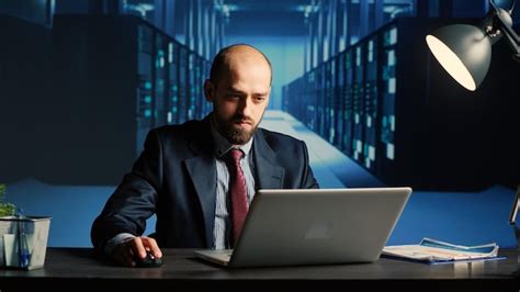 Technician Working on a Computer Under Pressure
