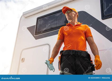 Technician inspecting an RV engine