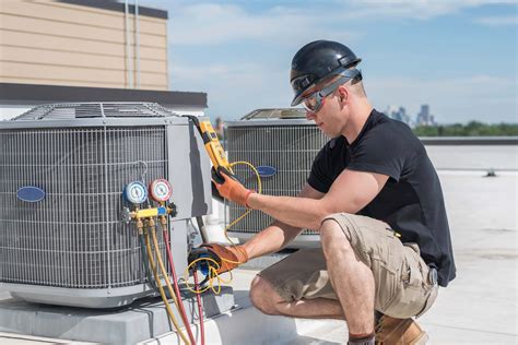 Technician working on HVAC system