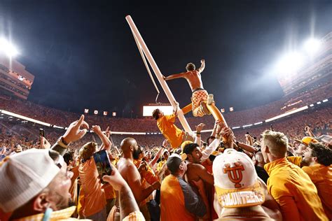 Tennessee Volunteers' goal post surrounded by celebrating fans