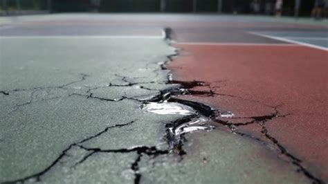 Tennis Court Surface Damage