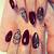 The Art of Mystery: Dark Red Nail Art to Channel Your Inner Enigma