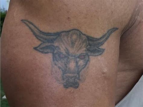 The Rock's bull skull tattoo upgrade.