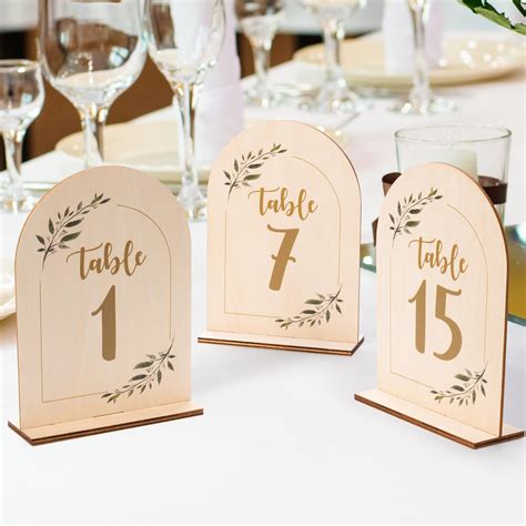 The Dual Functionality of Table Number Holders